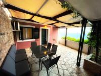 A balcony or terrace at Glyfada Beach House