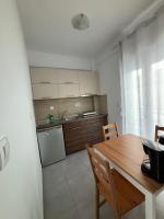 Kuchyňa alebo kuchynka v ubytovaní Villa Pearl