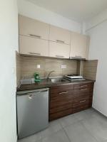 Kuchyňa alebo kuchynka v ubytovaní Villa Pearl
