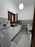 Kuchyňa alebo kuchynka v ubytovaní Holiday Home Tarinuzza