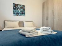 Posteľ alebo postele v izbe v ubytovaní Blue Horizon 6