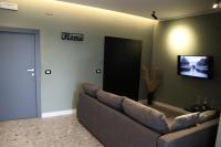 Gate 16 Room Napoliにあるテレビまたはエンターテインメントセンター