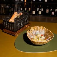 a table with a basket and a bowl of food at Le Agavi Resort & SPA in Saludecio