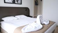 Postel nebo postele na pokoji v ubytování PARK DEMİRKAPI HOTEL