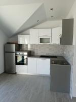 Kuchyňa alebo kuchynka v ubytovaní Apartments Kostelic