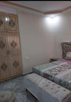 Postel nebo postele na pokoji v ubytování RESIDENCE DAR ALLOUCHE
