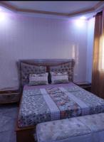 Postel nebo postele na pokoji v ubytování RESIDENCE DAR ALLOUCHE