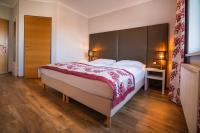 Posteľ alebo postele v izbe v ubytovaní Arion Airport Hotel
