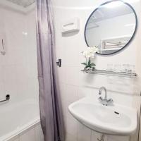 Een badkamer bij Hotel 't Witte Huys Scheveningen