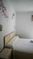 Posteľ alebo postele v izbe v ubytovaní Rural Tarifa Villa María
