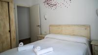 Posteľ alebo postele v izbe v ubytovaní Rural Tarifa Villa María