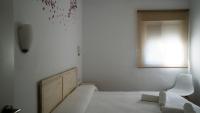 Posteľ alebo postele v izbe v ubytovaní Rural Tarifa Villa María