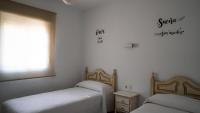 Posteľ alebo postele v izbe v ubytovaní Rural Tarifa Villa María