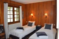 Posteľ alebo postele v izbe v ubytovaní Chalet L Olan 15p Emplacement exceptionnel grand terrain