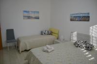 Posteľ alebo postele v izbe v ubytovaní Giu Al Mar - Apartment