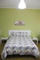A bed or beds in a room at Comeacasatua