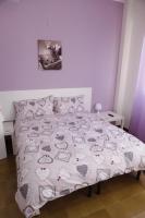 A bed or beds in a room at Comeacasatua