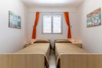 Posteľ alebo postele v izbe v ubytovaní Casa Vacanze Sogno Siciliano