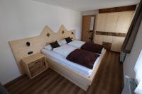 A bed or beds in a room at Gasserhof