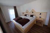 A bed or beds in a room at Gasserhof