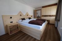 A bed or beds in a room at Gasserhof