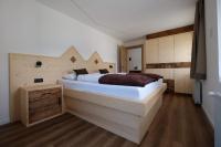A bed or beds in a room at Gasserhof