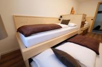 A bed or beds in a room at Gasserhof