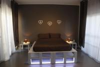 A bed or beds in a room at Comeacasatua