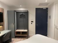 OZO Hotels Antares Airportにあるベッド