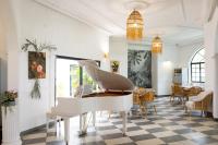 Posezení v ubytování Le Palais d'Akwa