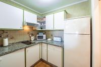 A kitchen or kitchenette at Bonito Piso a 1 minuto de la Playa