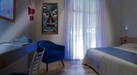 Posteľ alebo postele v izbe v ubytovaní Hotel Savoia