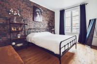 Posteľ alebo postele v izbe v ubytovaní Studio Cosy Tout Confort Porte Orléans 2 Pers Paris