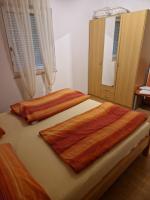 Postel nebo postele na pokoji v ubytování Apartment Matošić