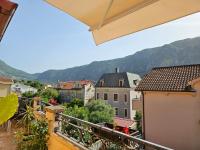 a view of a city from a balcony at Apartments Carpe Diem in Kotor