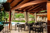 A restaurant or other place to eat at Green Oasis Gabella