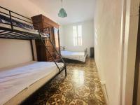 Posteľ alebo postele v izbe v ubytovaní Maison cosy avec clim, WiFi, proche port et plages, 6 pers., Port-Vendres - FR-1-309-367