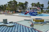 a water park with a slide and a playground at Apartment in Zaton-Nin in a beautiful environment in Nin