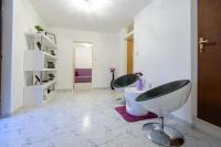 TV a/nebo společenská místnost v ubytování Apartment Ema