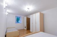 Postel nebo postele na pokoji v ubytování Apartment Ema