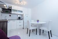 Kuchyň nebo kuchyňský kout v ubytování Apartment Ema