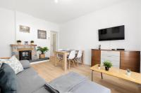 A television and/or entertainment centre at Barcelona coast apartment - only 5 minutes to the beach