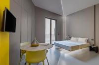 Posteľ alebo postele v izbe v ubytovaní Fiveplace Design Suites & Apartments