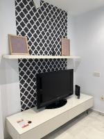 TV a/nebo společenská místnost v ubytování La Piccola Cadiz