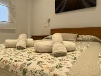 Postel nebo postele na pokoji v ubytování La Piccola Cadiz