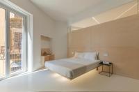 Posteľ alebo postele v izbe v ubytovaní Fiveplace Design Suites & Apartments