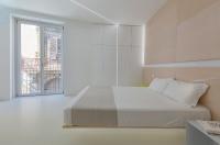 Posteľ alebo postele v izbe v ubytovaní Fiveplace Design Suites & Apartments