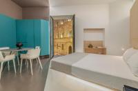 Posteľ alebo postele v izbe v ubytovaní Fiveplace Design Suites & Apartments