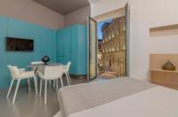 Posteľ alebo postele v izbe v ubytovaní Fiveplace Design Suites & Apartments