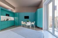 Posteľ alebo postele v izbe v ubytovaní Fiveplace Design Suites & Apartments